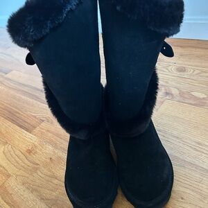 Woman’s suede bear paws